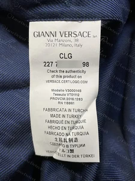 Genuine Versace care label: GIANNI VERSACE S.p.A., Via Manzoni 38, 20121 Milano, a CLG code (middle digits blurred), the Certilogo address, Modello, Tessuto and made-in lines in many languages
