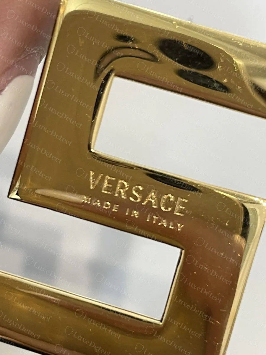Authentic Greca key buckle with VERSACE and MADE IN ITALY engraved on the front of the buckle