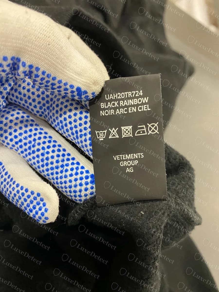 Genuine Vetements black care label printed UAH20TR724, BLACK RAINBOW, NOIR ARC EN CIEL, five wash symbols and VETEMENTS GROUP AG
