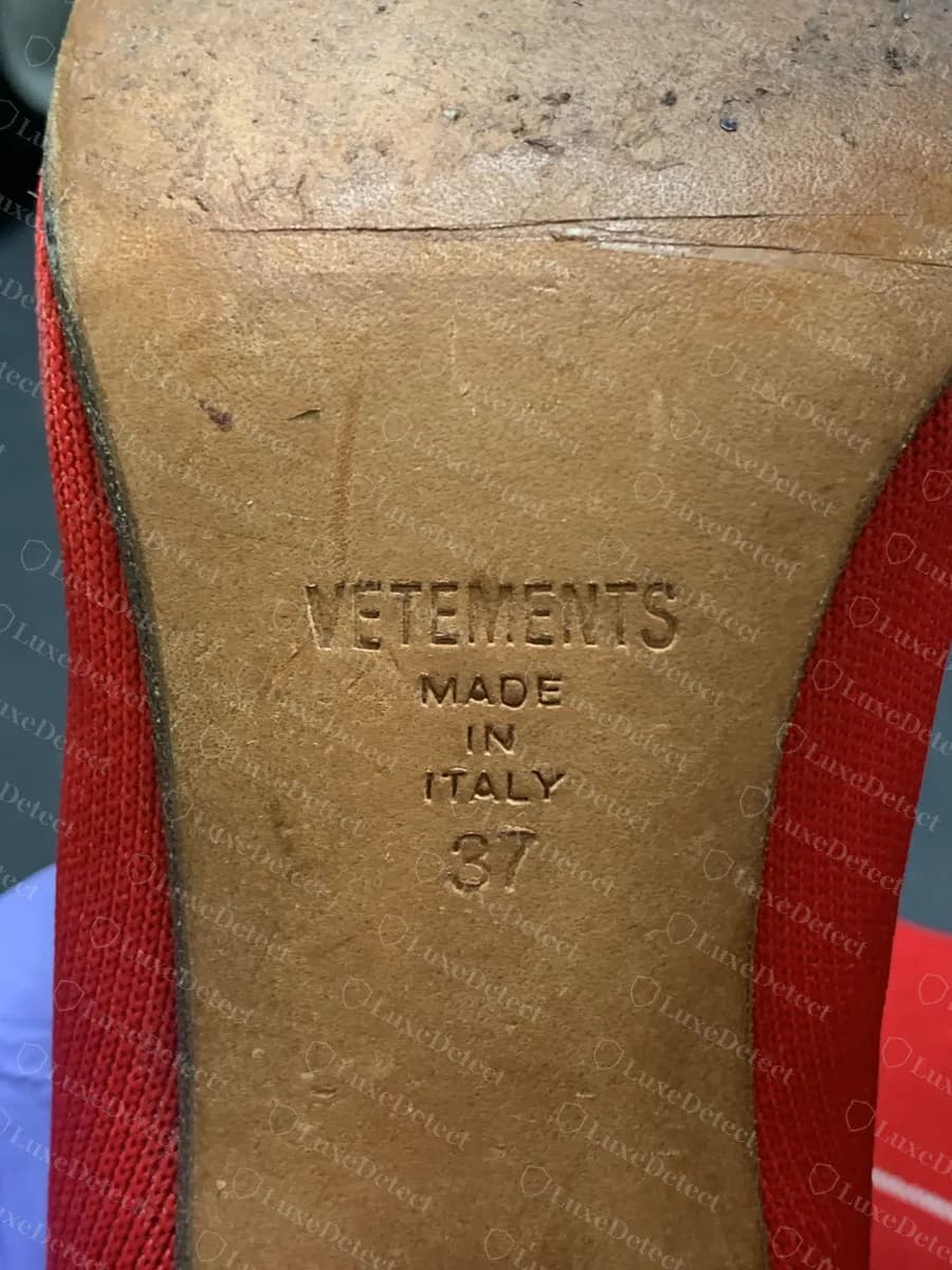 Genuine Vetements leather sole of a red sock boot stamped VETEMENTS, MADE IN ITALY and size 37