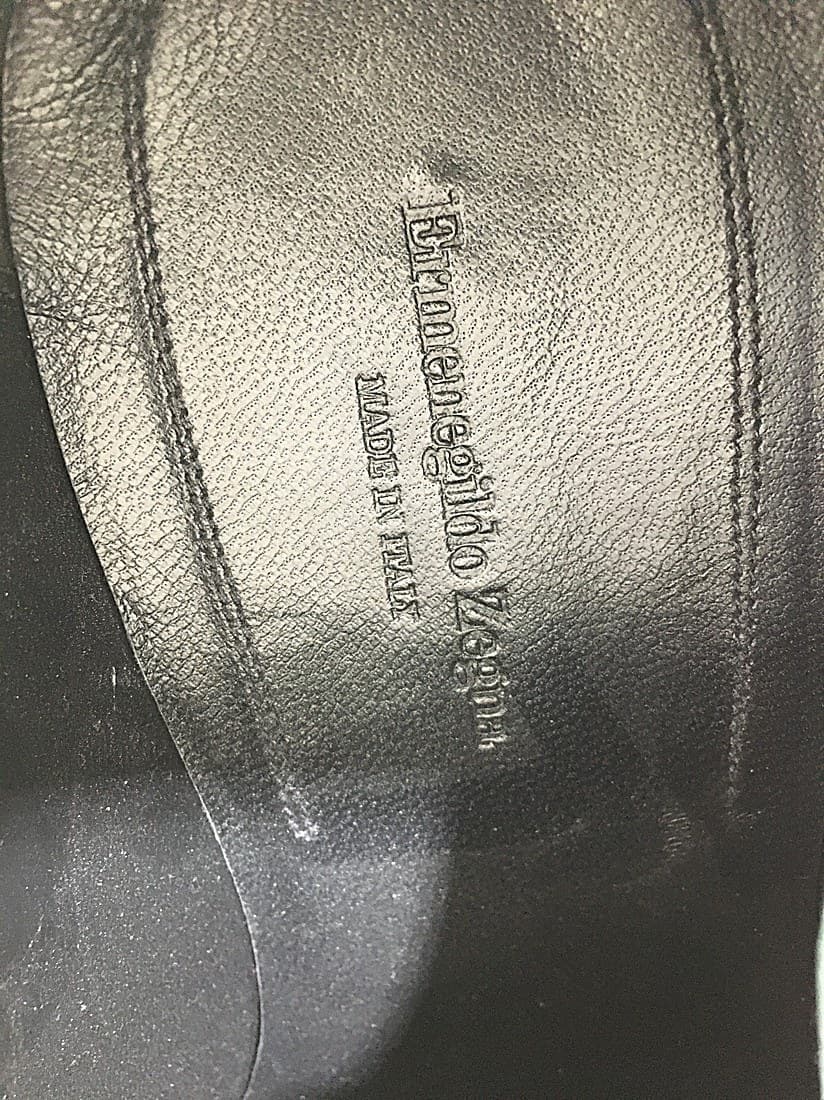 Genuine Ermenegildo Zegna shoe insole stamp — "Ermenegildo Zegna" in script alongside "MADE IN ITALY," pressed cleanly into the leather footbed